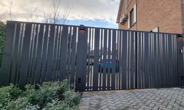 Aluminium vleugelpoort met verticale profielen - Model Cupro